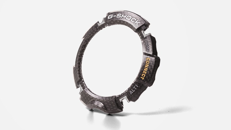 Carbon fiber inserted bezel